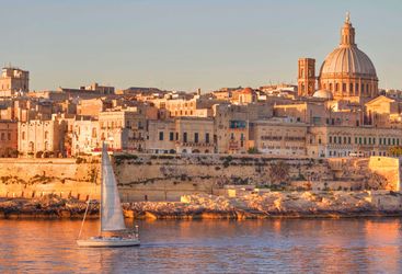 Valletta boat at sunset