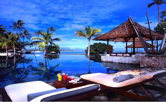 Oberoi Lombok swimming pool and sun beds