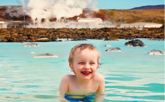 Smiling boy in the Blue lagoon