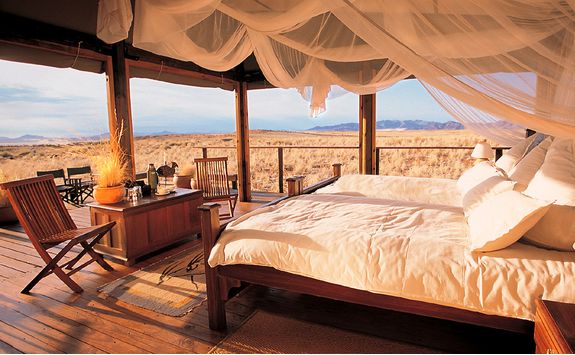 A bedroom view from Wolwedans Dune Lodge