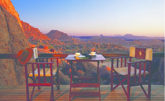 Table and chairs with a view at Mowani