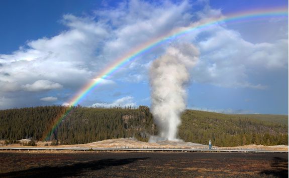 Rainbow over Old Faithful