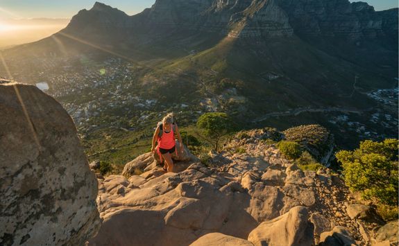 Woman hiking up Table Mountain
