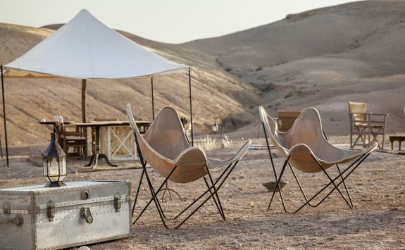 Chairs in the desert at Scarabeo Stone Desert Camp