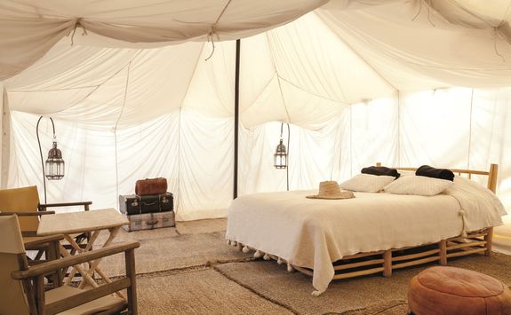 Inside of a tent at Scarabeo Desert Camp
