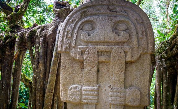 Statue in rainforest