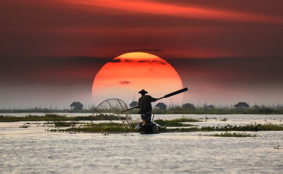 Fisherman at sunset on Inle Lake