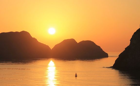 Boat at sunrise