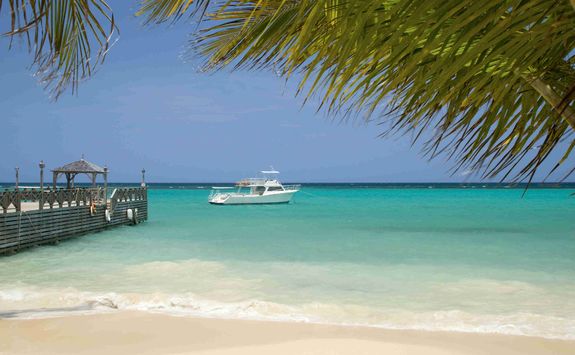 Boat moored by the beach
