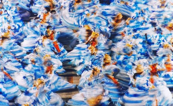 Dancers dressed in blue