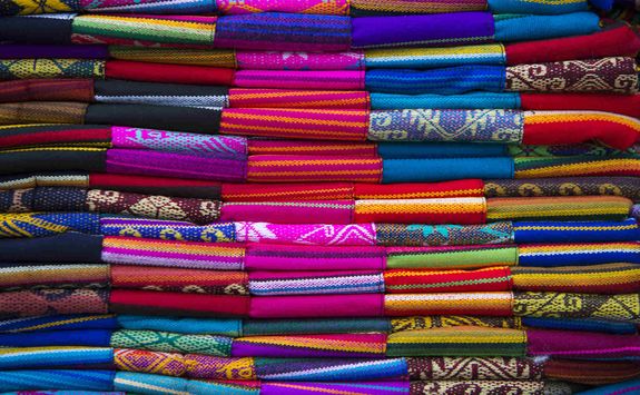 Colourful fabrics in a Peruvian market