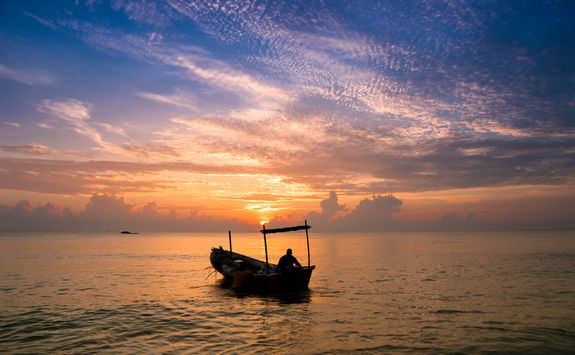Fisherman in the dusk