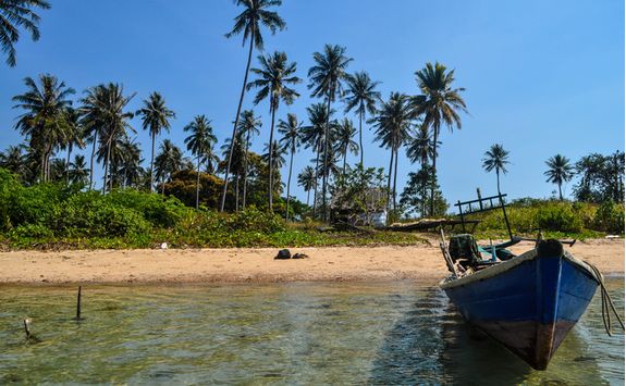 A boat ashore a beach