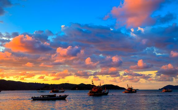 Boats under a Sunset