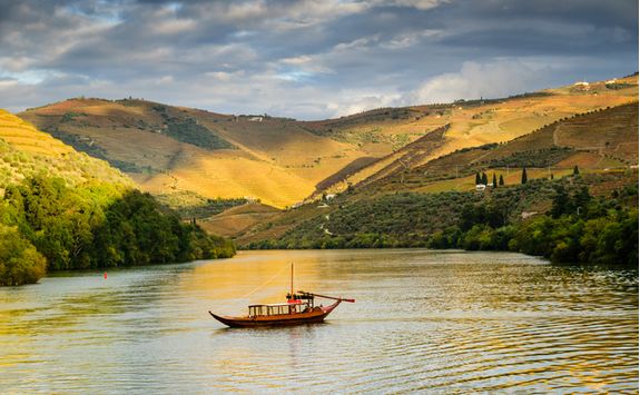 Boat cruising along the river Douro