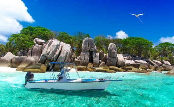 a boat in the tropical ocean