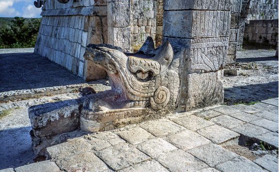 a detailed serpent statue at chichen itza