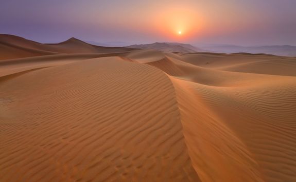 sunset over the Omani desert
