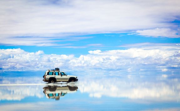 Car driving across the salt flats