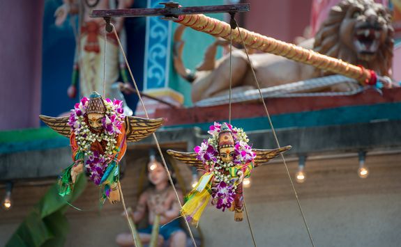 Figurines hanging outside temple