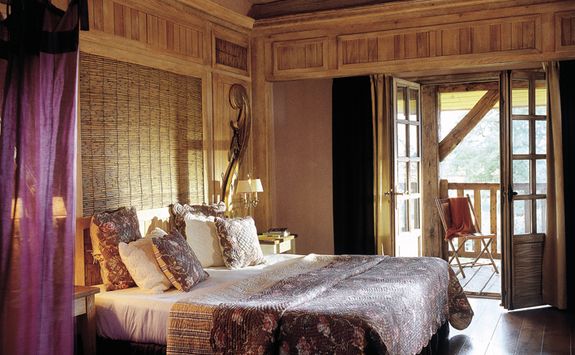 A bedroom at Les Sources de Caudalie