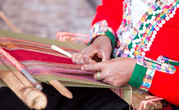 Peruvian woman weaving
