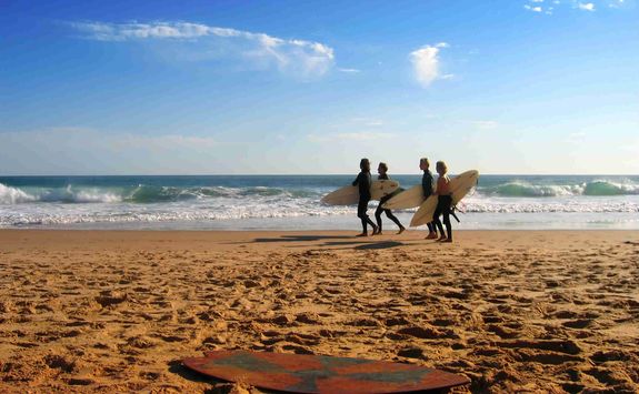 Surfers on a Beach