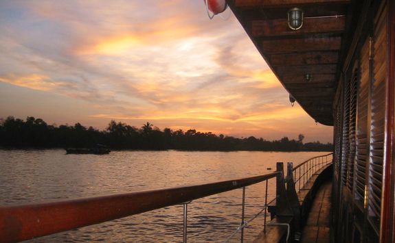 Sunset bassac ship