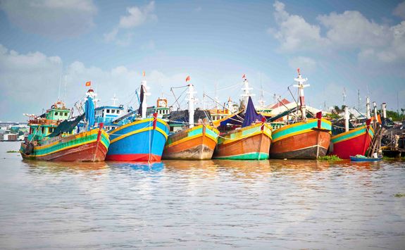 fishing boats on the mekong delta