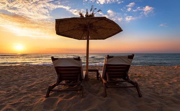 Sun loungers and umbrella