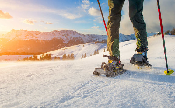 Walk with snowshoes in alps