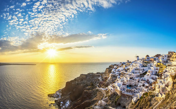 Sun setting over Oia