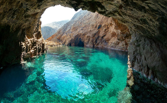 Rocky arch on the shores of Mykonos