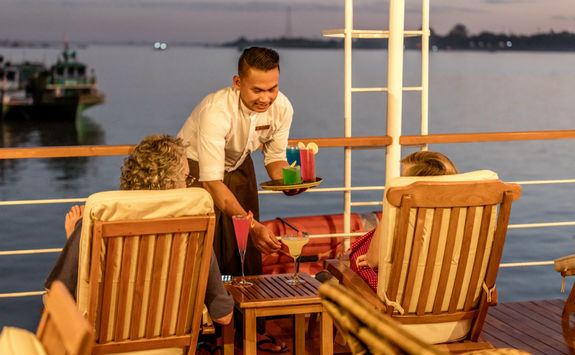 Serving cocktails on the RV Zawgyi