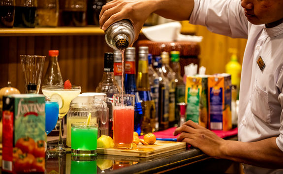 Pouring cocktails