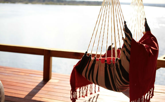 Swing chair on a jetty