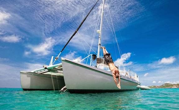 Man diving off a boat