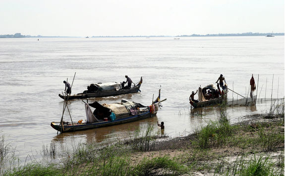 Men fishing on Mekong River