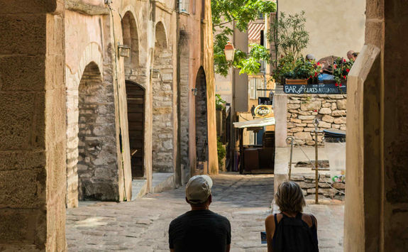 Couple in an old street of Bonifacio