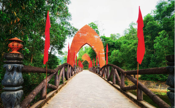 bridge with flags at old hindu temples
