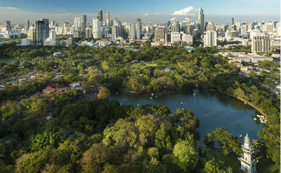 lumphin park and the downtown bangkok city skyline