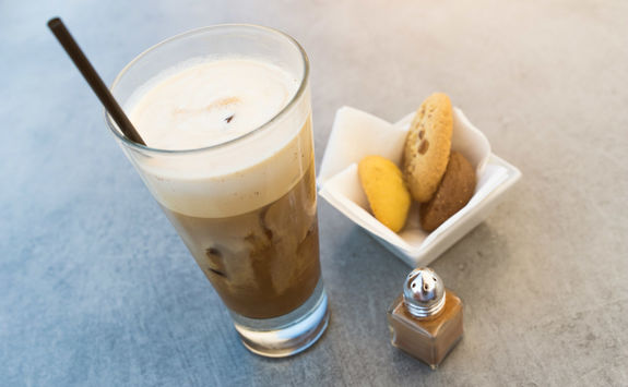 Glass of frappe, a greek iced coffee