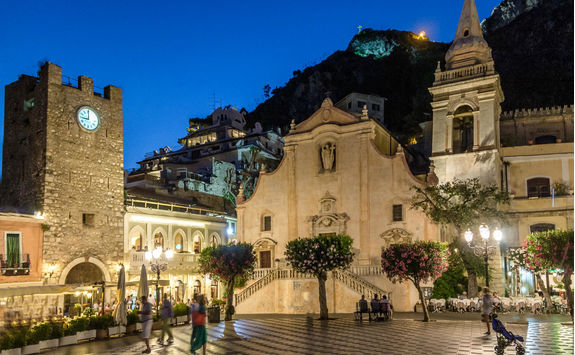 Taormina main square with San Giuseppe church and the Clock tower at night