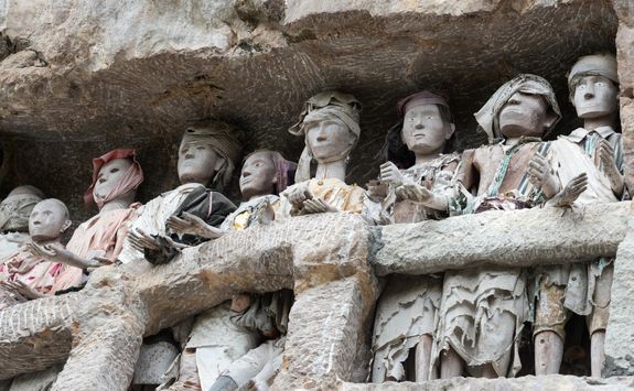 wooden statues of tau tau