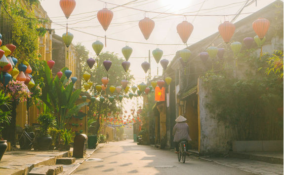 Woman walking on the morning in Hoi An