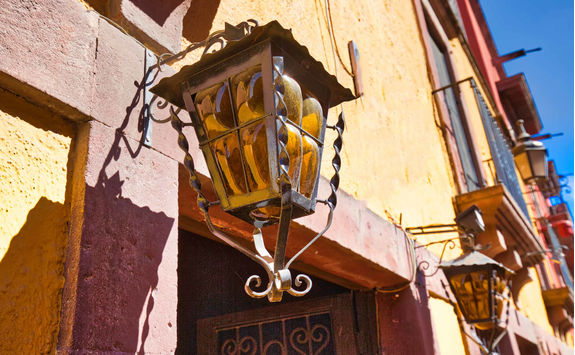 Colourful floor lamp in historic city center