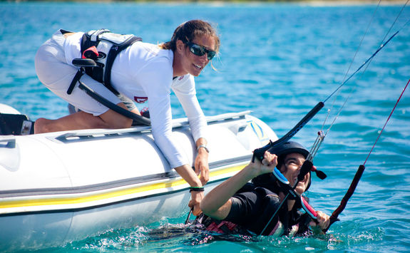 Child learning to windsurf in Antigua