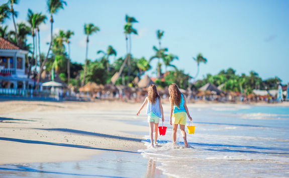 Two girls on a beach in Antigua