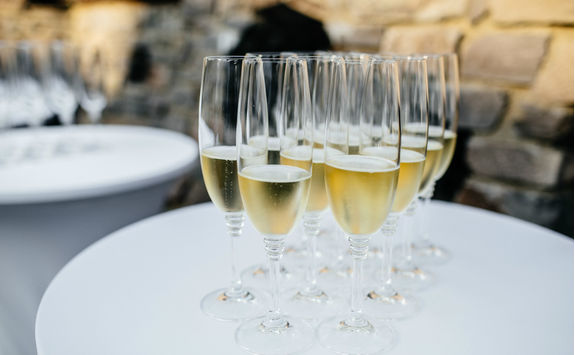 Full glasses of Champagne