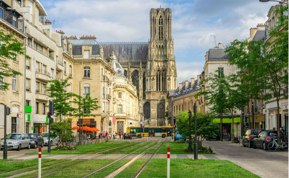 Tram on the streets and architecture of Reims